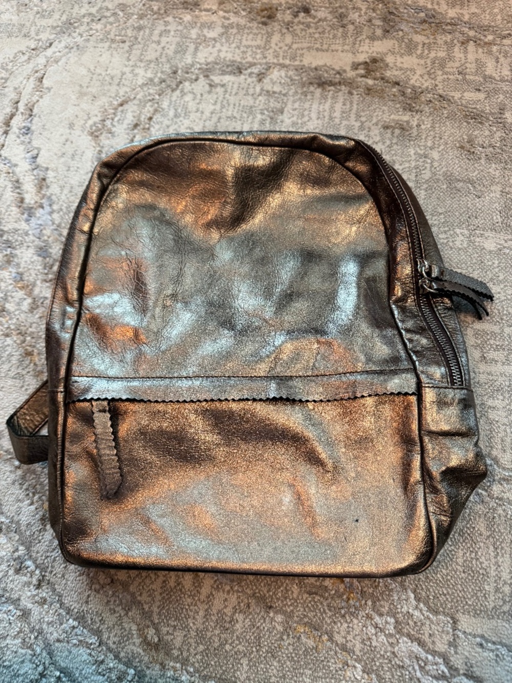 Handmade metallic leather backpack from Spain